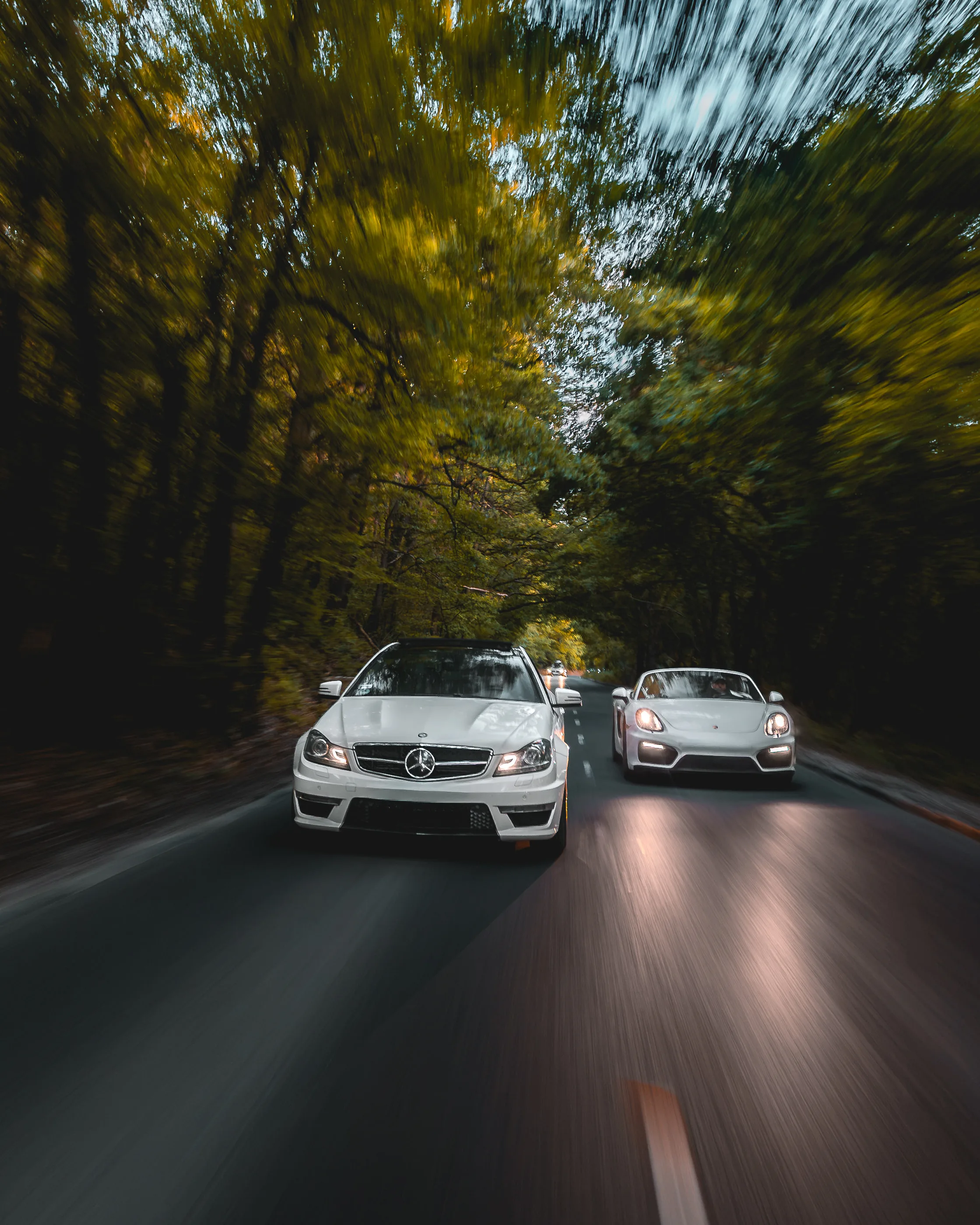 Mercedes-AMG C 63 / Porsche 718 Boxster GTS, low sun
